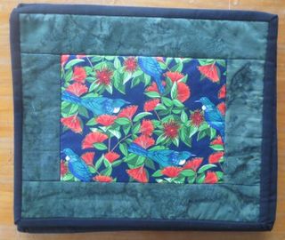 Tui in Pohutukawa Table Mats - set of 4
